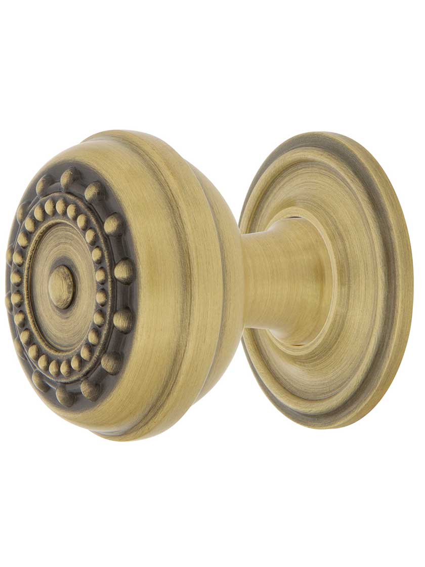 Meadows Cabinet Knob - 1 3/8 inch Diameter with Classic Rosette in Antique Brass.
